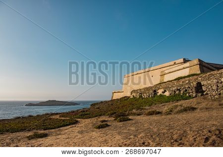 Fort facing the Atlantic ocean and the Island of Pessegueiro in Porto Covo, Portugal
