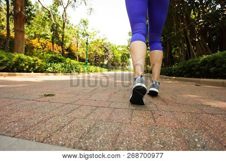 Close Up Of Feet Of Runner Running In Park Training For Marathon And Fitness Healthy Lifestyle, Sele