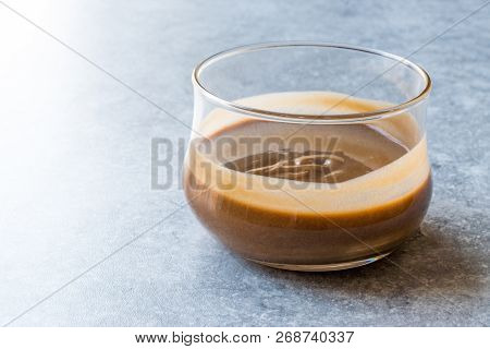 Turkish Tahin Pekmez / Tahini And Molasses In Glass Bowl.