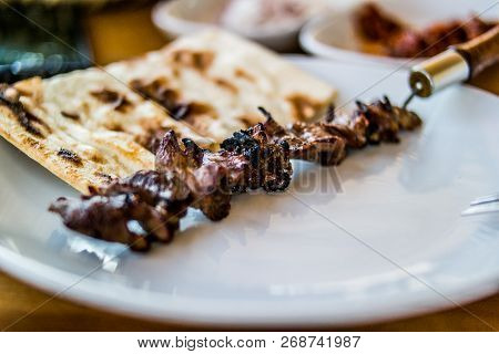 Turkish Cag Kebab Doner On Skewers. Copy Space.