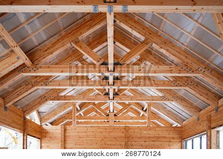 Roof Construction Of Big Wooden Trusses Closeup