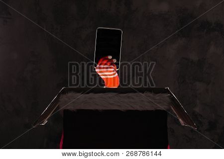 Christmas Gift Concept. Hand Bring Gift For You. Hand In Gloves From Big Box.  Christmas And New Yea