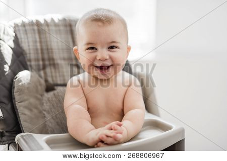 Baby Sit On His Chair Waiting For The Diner