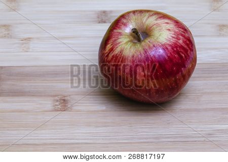 Red Apple On The Table