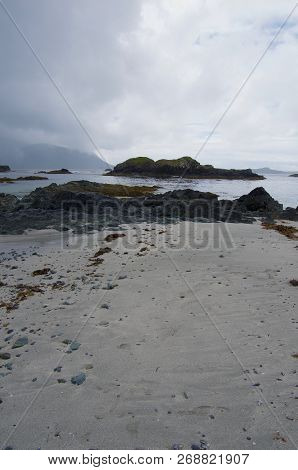 After A Squall-grey Beach, Grey Clouds And A Bit Of Sunshine, Nuchatlitz Inlet, British Columbia