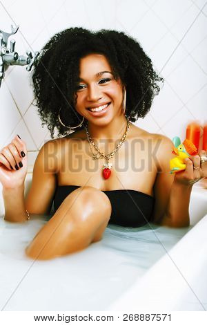 Young Pretty African American Girl Taking Bath With Foam, Lifest