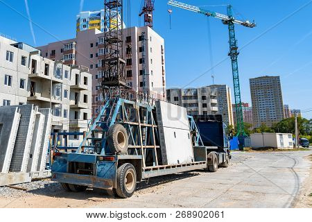 Modern Construction Site Of Building With Crane