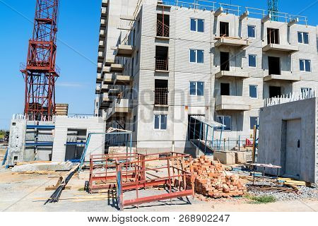Modern Construction Site Of Building With Crane