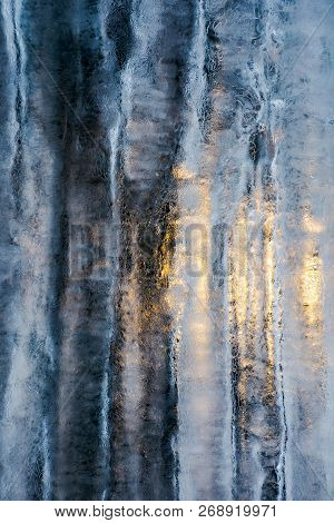 Beautiful Ice Texture Lit From Behind. Ice And Sun, Cold And Warm, Winter And Spring Resistance Conc