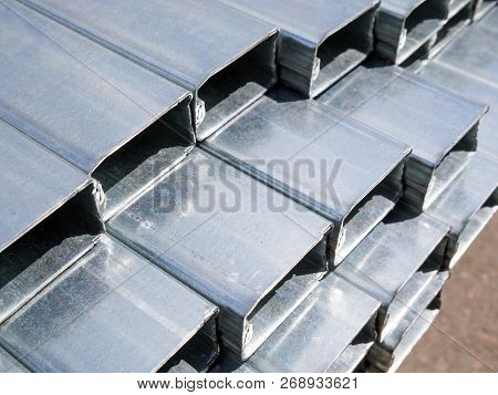Galvanized Profile Tube Of Rectangular Section Lies On The Village