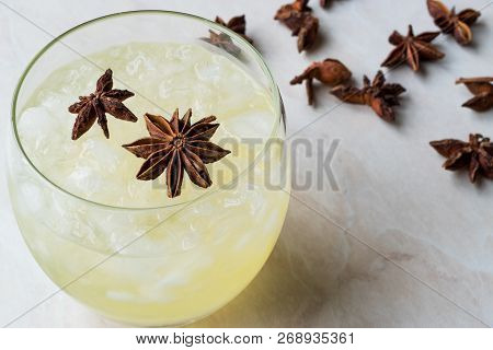 Cardamom Cocktail With Anise Star And Crushed Ice.