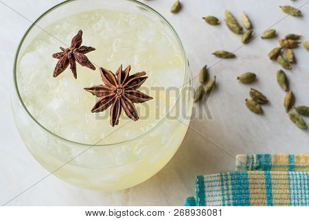 Cardamom Cocktail With Anise Star And Crushed Ice.