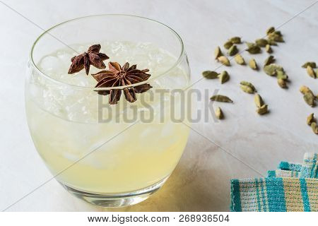 Cardamom Cocktail With Anise Star And Crushed Ice.