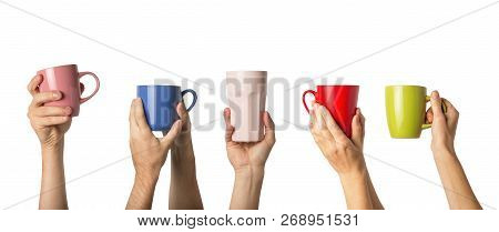 Many Different Hands Holding Multi Colored Cups Of Coffee On A White Background. Female And Male Han