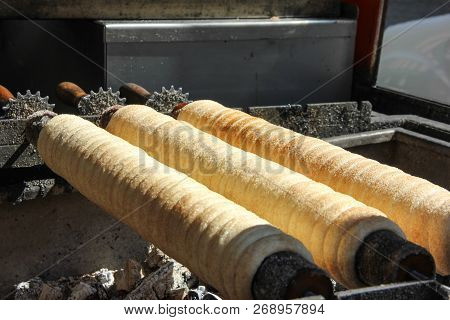 Cooking Sugarcoated Rolls, Traditional Sweet Pastry, Street Food, Trdelnik In Prague, Czech Republic