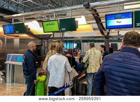Ferno, Milan-malpensa, Italy - November 4, 2018: Check-in Desk At Airbaltic Company For Riga Flight 