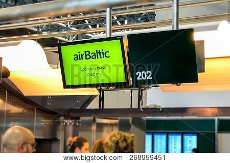 Ferno, Milan-malpensa, Italy - November 4, 2018: Display For Check-in Of Economy Class At Airbaltic 