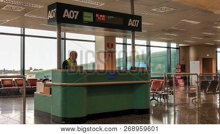 Ferno, Milan-malpensa, Italy - November 4, 2018: Desk Of The Gate Of Airbaltic Company To Riga Fligh