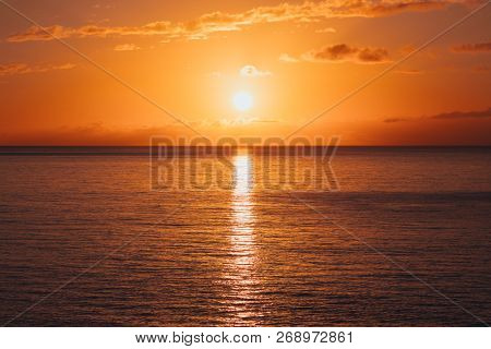 sunrise at ocean seascape with reflection