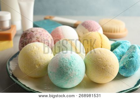 Plate With Colorful Bath Bombs On Table, Closeup