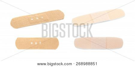Set With Adhesive Plaster On White Background. First Aid