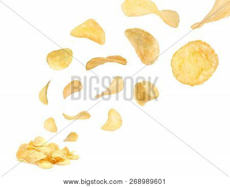 Tasty Potato Chips Falling On White Background