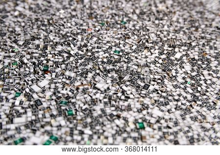 Electronic Components In Bulk. Texture Of Chip Resistors