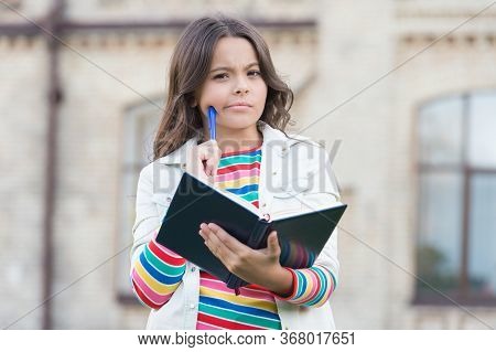 Making Notes. Inspired Poet. Talented Cute Schoolgirl. Access To Much More Than Just Book. Knowledge