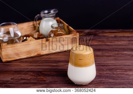 Dalgon Coffee With Ingredients For Its Preparation In A Box On A Wooden Background. Instant Coffee, 
