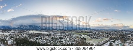 Aerial Drone Shot View Of Outskirts And Austrian Alps Untersberg With Heavy Fog In Winter