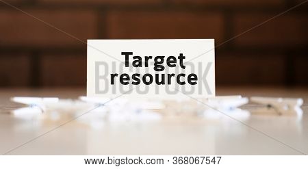 Target Resourse - Text Of Business Concept On White List And With Clothespins