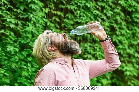 Drain The Bottle. Daily Intake Of Water. Thirsty Male Model Enjoying Refreshing Drink. Healthy Eatin