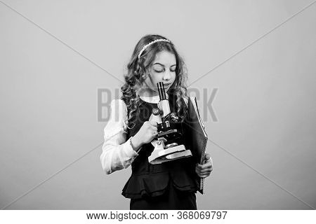 Science Research In Lab. Small Genius Girl With Microscope. Education And Knowledge. Small Girl Scie