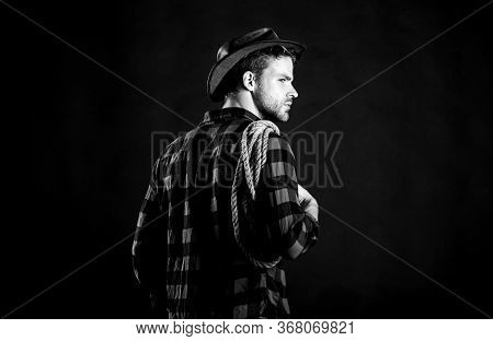 Countryside. Vintage Style Man. Wild West Retro Cowboy. Cowboy With Lasso Rope. Western. Man Checker