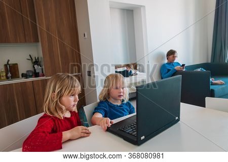 Kids Learning Remotely With Father Works From Home, Family Stay Idoors
