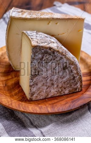 Cheese Tomme De Montagne Or Tomme De Savoie Made From Cow Milk In French Alps.