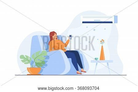Woman Relaxing In Arm Chair At Home, Turning On Air Conditioner System, Holding Remote Control Devic