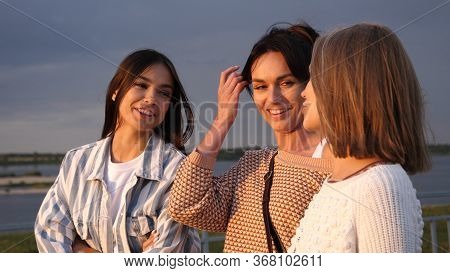 Beautiful Young Casual Women Waiting, Chatting And Lauging.
