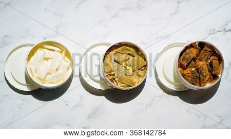 Three Boxes Of Snus, A Wet Powder Tobacco Product. Swedish Snus, Chewing Tobacco, Swedish Nicotine,