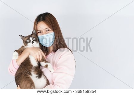Asian Beautiful Happy Woman Wearing A Medical Protection Face Mask For Protect The Coronavirus, Filt