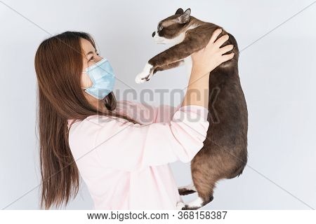 Asian Beautiful Happy Woman Wearing A Medical Protection Face Mask For Protect The Coronavirus, Filt