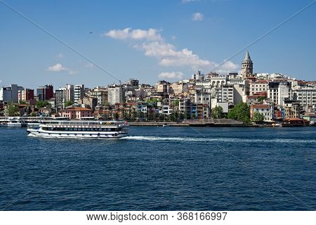 Turkey, Istanbul - May, 2020. Panoramic View To Galata Tower And Ferry In Istanbul City Scape With A