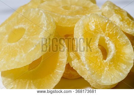Dried Pineapple Candy Rings, In Powdered Sugar, Close-up.