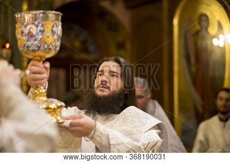 Kiev, Ukraine - 16 April 2017: The Divine Liturgy At The Kiev Holy Presentation Monastery. Deacon In