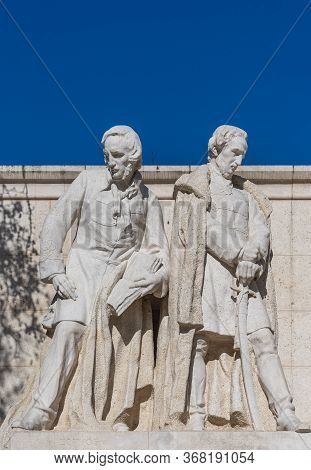 Budapest, Hungary-feb 8, 2020: Statue Of Hungary Minister Eotvos And Szechenyi At Kossuth Square