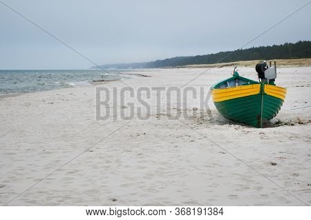 Fishing Boats On The Beach On A Cloudy And Foggy Day. Baltic Sea, Poland