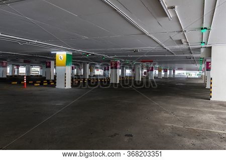 Empty Space Car Park Interior At Afternoon.indoor Parking Lot.interior Of Parking Garage With Car An