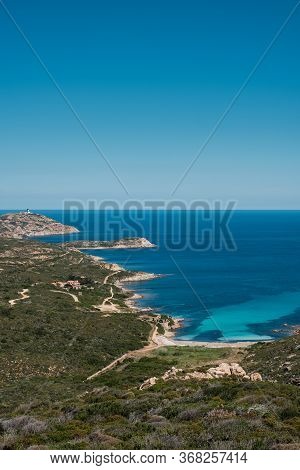 Turquoise Mediterranean Sea At The Plage De L'alga On The Rocky Coast Of La Revellata Near Calvi In 