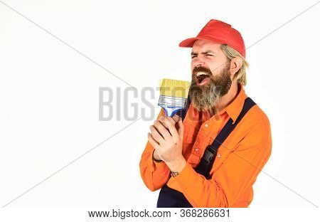 Talented Master. Priming Entire Wall. Bearded Mature Man Painter. Wall Painter With Painting Tool. H