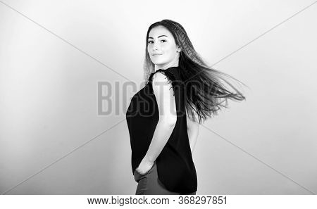Fashion Girl Stylish Hairstyle. Hair Crimping Method Styling Hair Become Wavy. Voluminous Crimped Ha